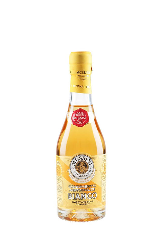 Bottle of Massini Bianco sweet white wine on a white background