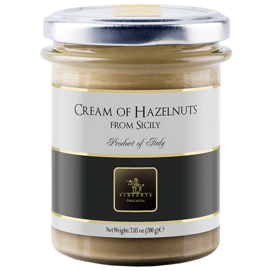 A jar of Vincente Cream of Hazelnuts from Sicily. The label is in black and gold with a clear window showing the cream inside.