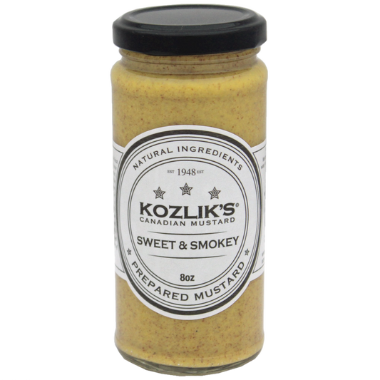 A jar of Kozlik's Sweet & Smokey Mustard with a label indicating that it is a prepared mustard. hot spicy grainy canadian mustard