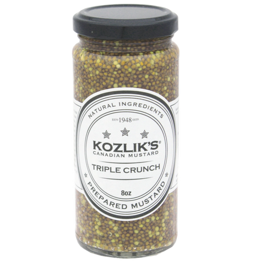 A jar of Kozlik's Canadian Mustard Triple Crunch with the label showing the product name and volume, 8oz (227gm).
