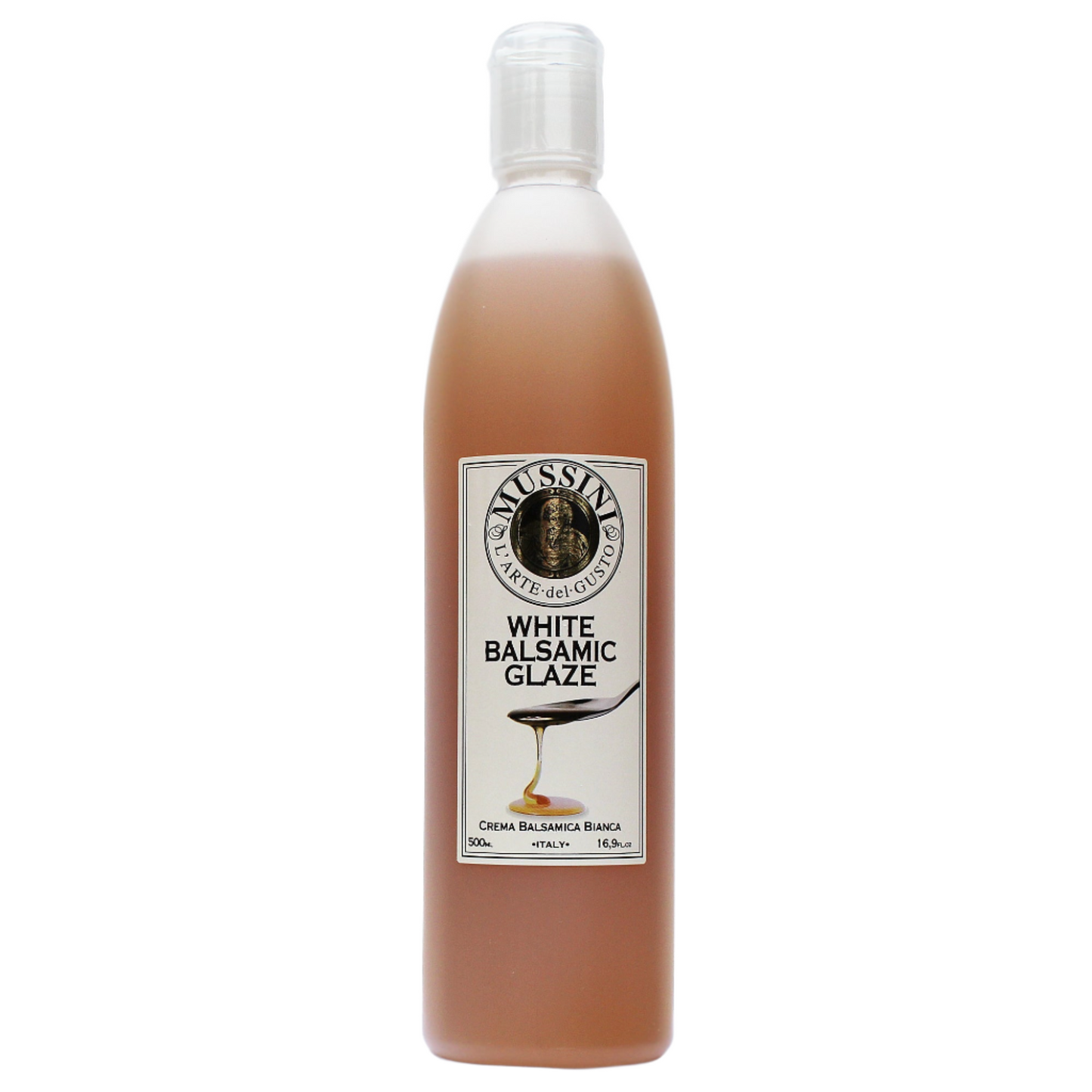 Bottle of Mussini White Balsamic Glaze with a label showing the product name and volume.