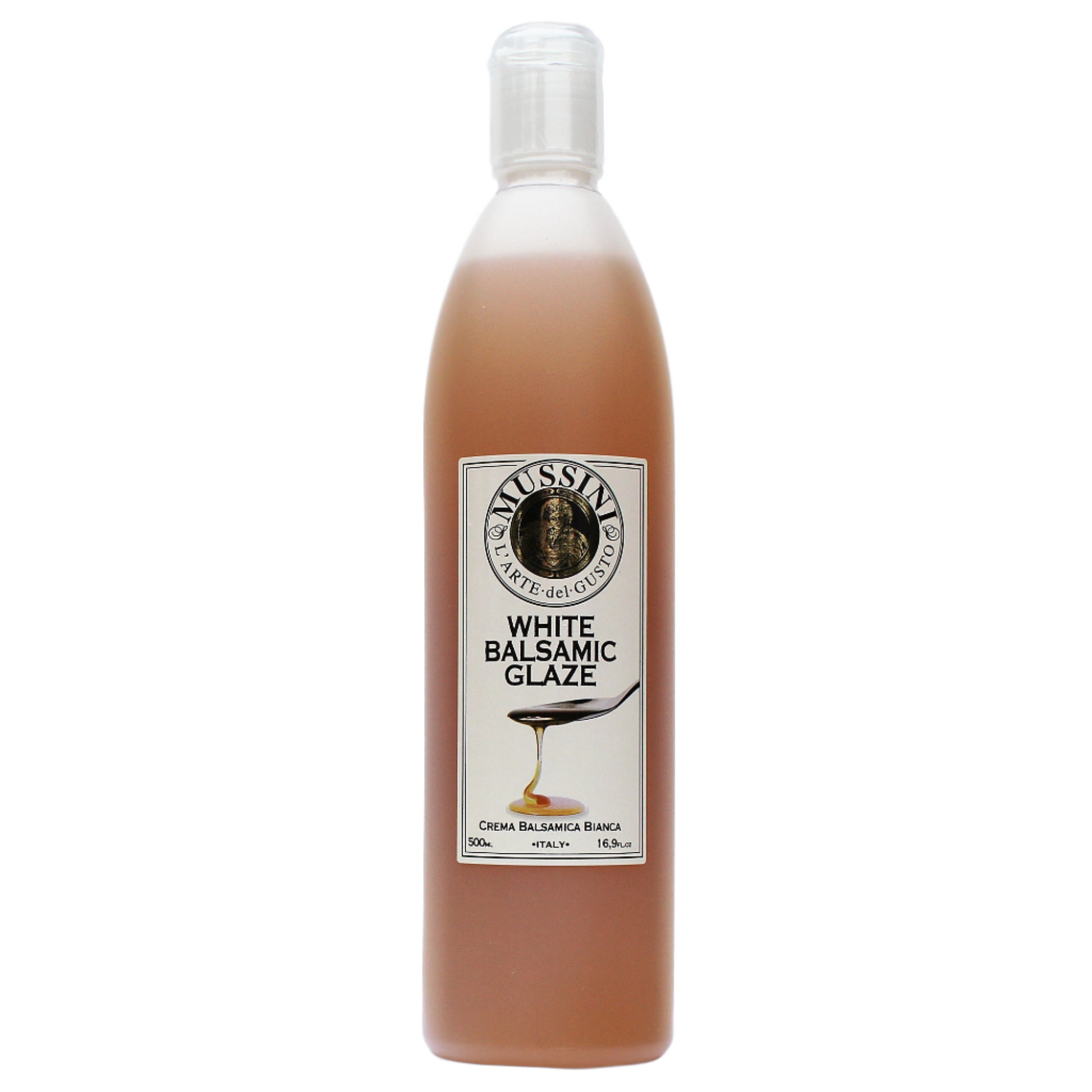 Bottle of Mussini White Balsamic Glaze with a label showing the product name and volume.