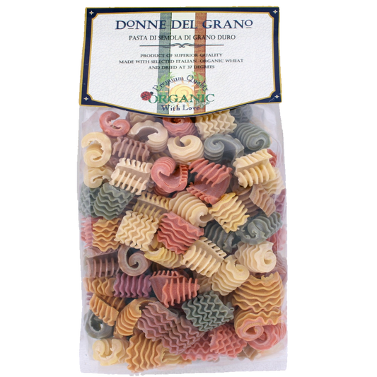 Packaged Spugnole (Morels) colored pasta from Donne Del Grano, featuring a variety of shapes and colors such as green, yellow, red, and beige, produced in Italy.