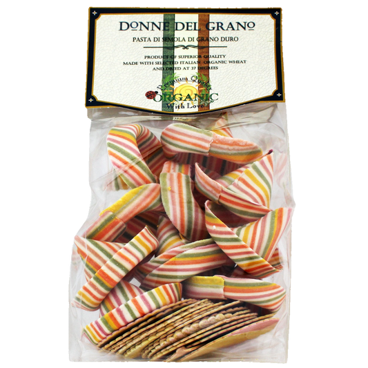 Packaged organic Mexican hats pasta in a clear plastic bag with a label showing the product name and a green, yellow, and red striped patterned design.